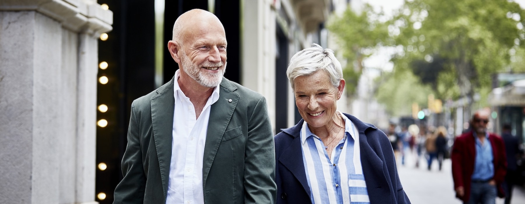 a man and a woman smiling