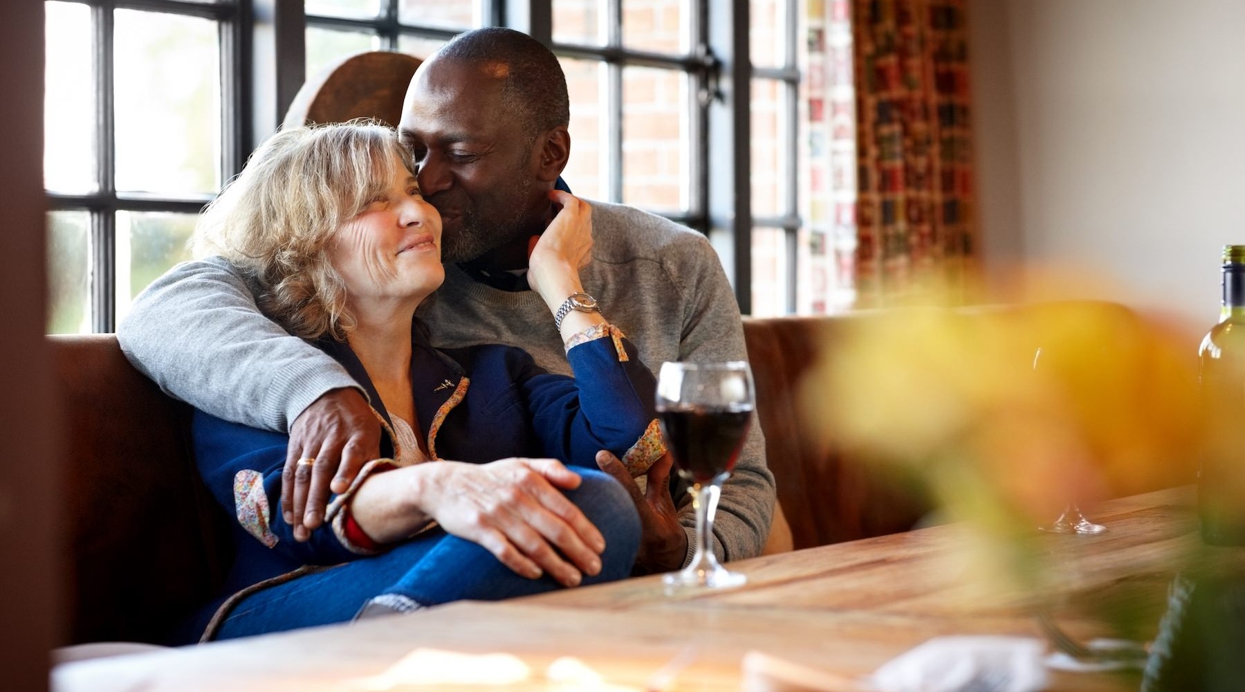 a couple sitting in a restaurant